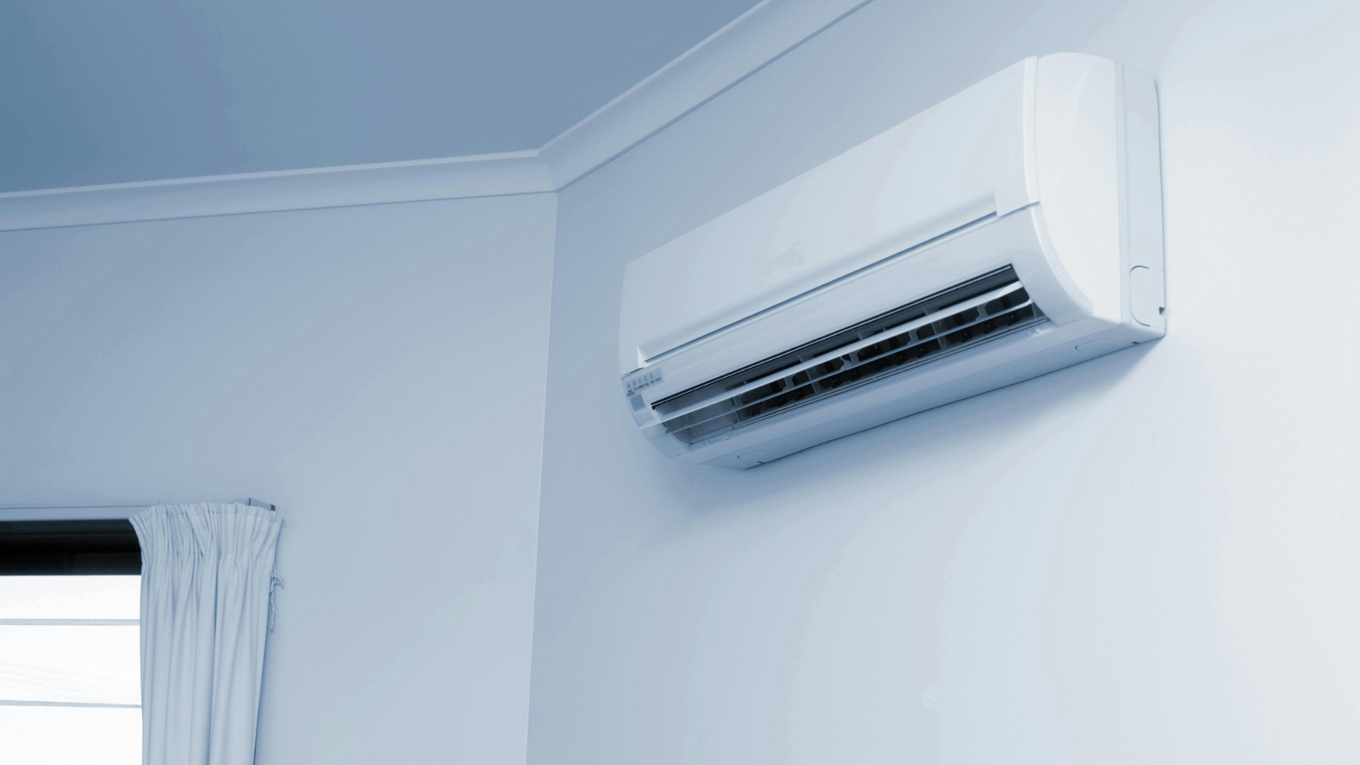Wall-mounted air conditioning unit installed in a Liverpool living room